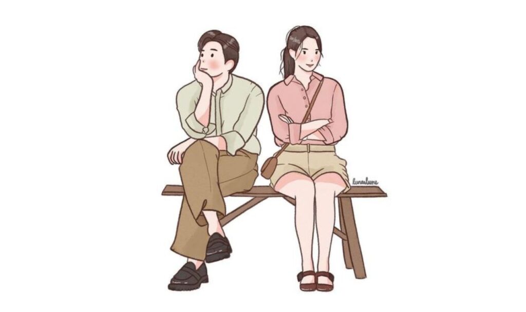 unhappy couple sitting on a bench